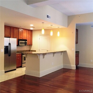 Kitchen with bar seating.