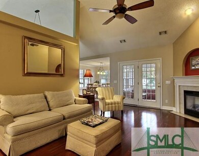 Living Room. This Open Floor Plan Carries Hardwood