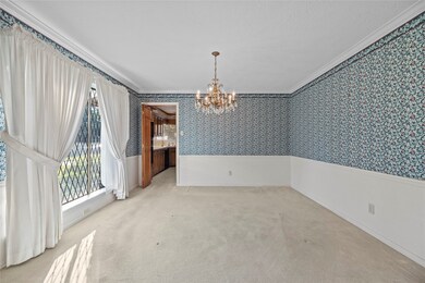 To the left of the entry is your formal dining are