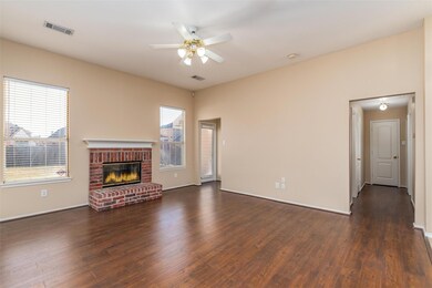 family room with wood burning fireplace