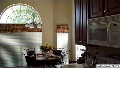 The kitchen and kitchenette compliment each other 