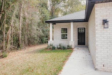 Brick Masonry with inviting entry!
