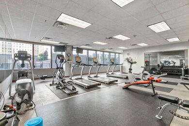 Exercise room featuring a paneled ceiling