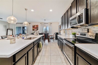 This awesome KITCHEN offers QUARTZ COUNTERS, a STO