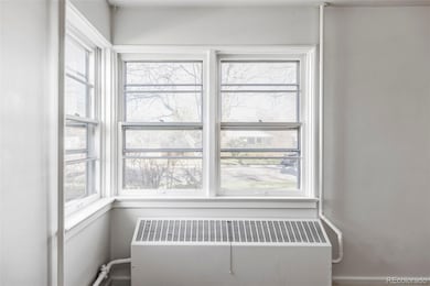 Luminous living room with east + north facing wind
