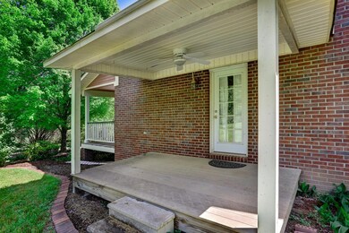 Side covered porch leading into Master Bedroom