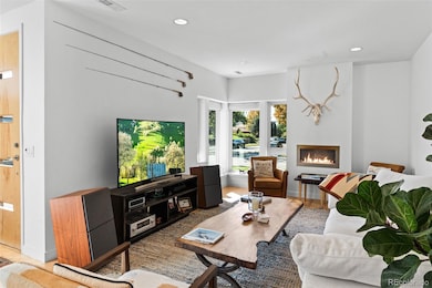 Living room with a cozy fireplace.