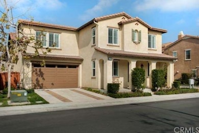 FRONT: 2-car attached garage with direct access ha