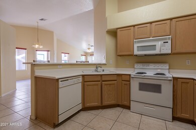 KITCHEN W/ WHITE APPLIANCES