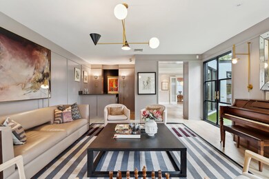 Another view of the formal living room looking bac