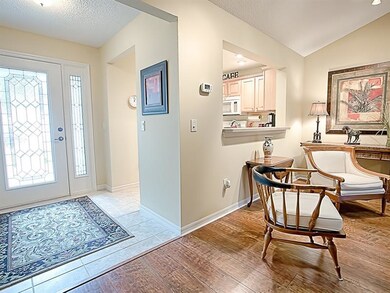 BEAUTIFUL leaded-glass front door entry into the T