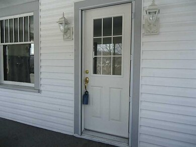 Exterior Front. Nice entryway-vinyl siding.