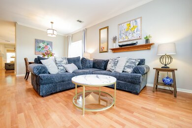 Welcome guests into the living area that features