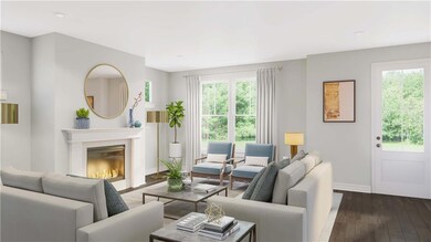 Virtually staged! Family room retreat with cozy fi