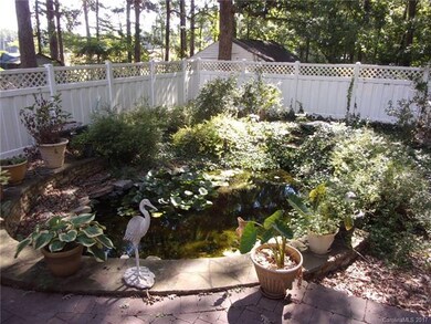 POND AND LANDSCAPING IN REAR