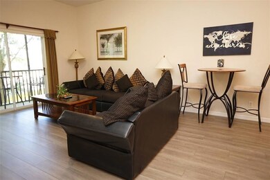 Living room with balcony and garden view