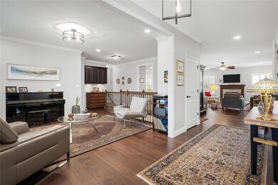 You will appreciate the open concept feeling upon entry with a wide entry foyer and expanded case opening to the Dining Room currently used as a music room.