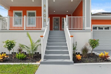 View of exterior entry with covered porch and an a
