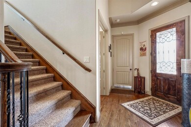 Foyer featuring hardwood / wood-style flooring and