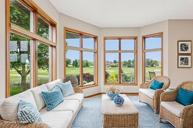 Amazing views from all angles of this sitting room off the kitchen and dining areas! *Virtually staged to show design options.
