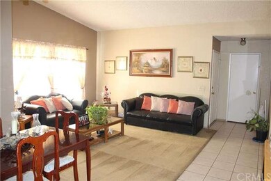Living room with lots of natural light, cathedral 