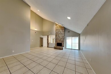 Unfurnished living room with a textured ceiling, a