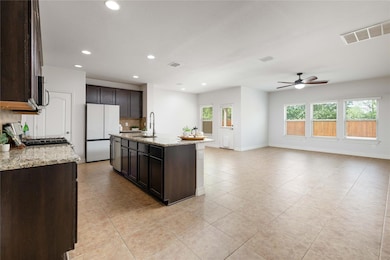 Kitchen with a sink, appliances with stainless st