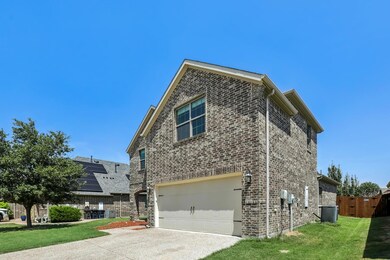 Front and side of Brick Exterior Home