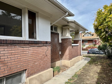 View of home's exterior featuring brick siding