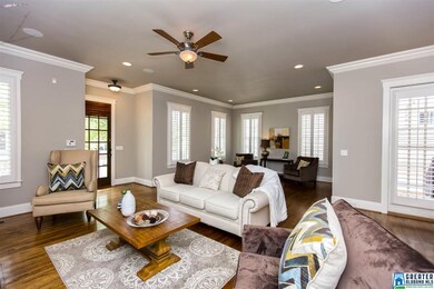 Large open floor plan opens to the kitchen and din