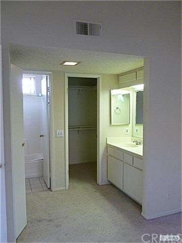 Bedroom walk in closet , sink, vanity