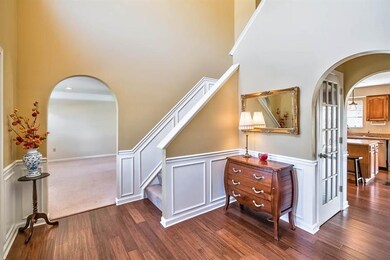 2 Story Hardwood Entry Foyer with Custom Chandelie