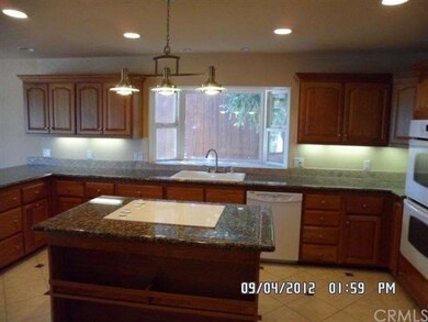 Kitchen w/storage in center island, garden window,