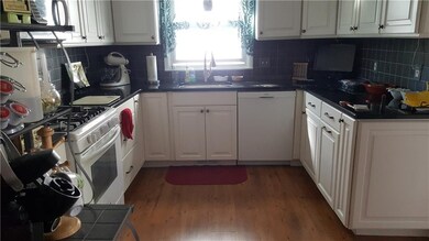Kitchen redone with granite counters, ceramic back