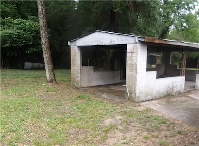 single carport or possible patio