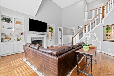 Hardwood floors and stone gas fireplace.