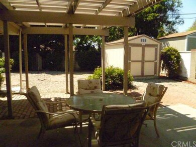 STORAGE SHED AND POTENTIAL PARKING AREA BEHIND THE