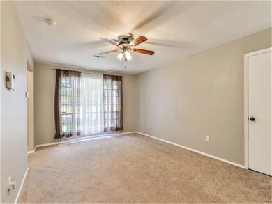 The front room gets tons of light from the beautiful large bay window.