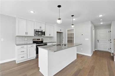 707 SW Glenn Cir, Raymore, MO 64083 - photo 2