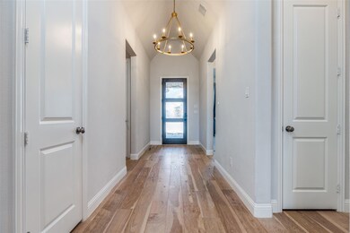 A spacious foyer will greet your guests and give t