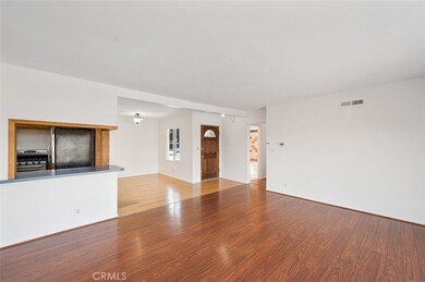 Living Room (looking NW) with view of Dining Room and Kitchen