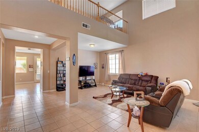 Living room with loft upstairs