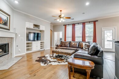 Living area with built-in shelves and gas FP