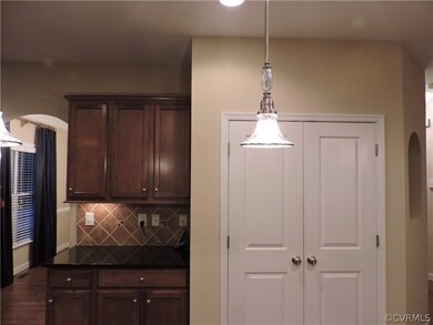 Additional cabinets, granite counter and tile back