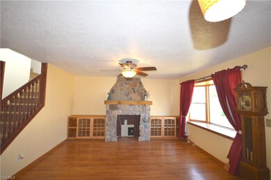 Formal dining room with a stone front 