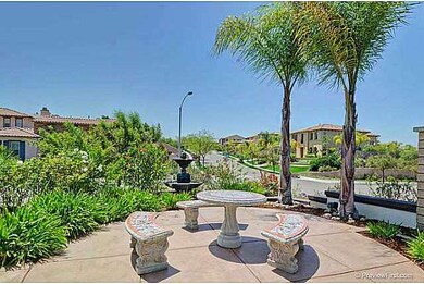 Front yard sitting area with fountain