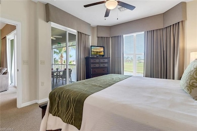 Bedroom featuring ceiling fan, access to exterior,