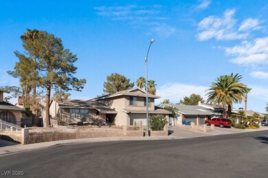 View of front of home featuring driveway, stucco s