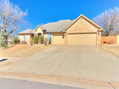 Single story home featuring driveway, a shingled r