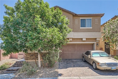 View of front of house featuring stucco siding, de